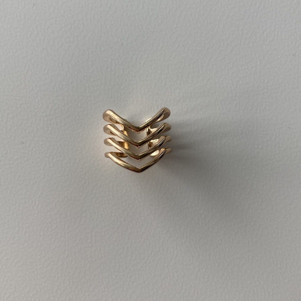 Gold chevron knuckle ring
